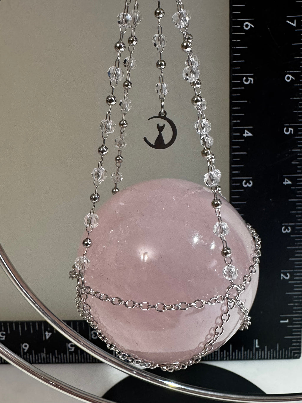 Rose Quartz Sphere with Crescent Moon Hanging Stand