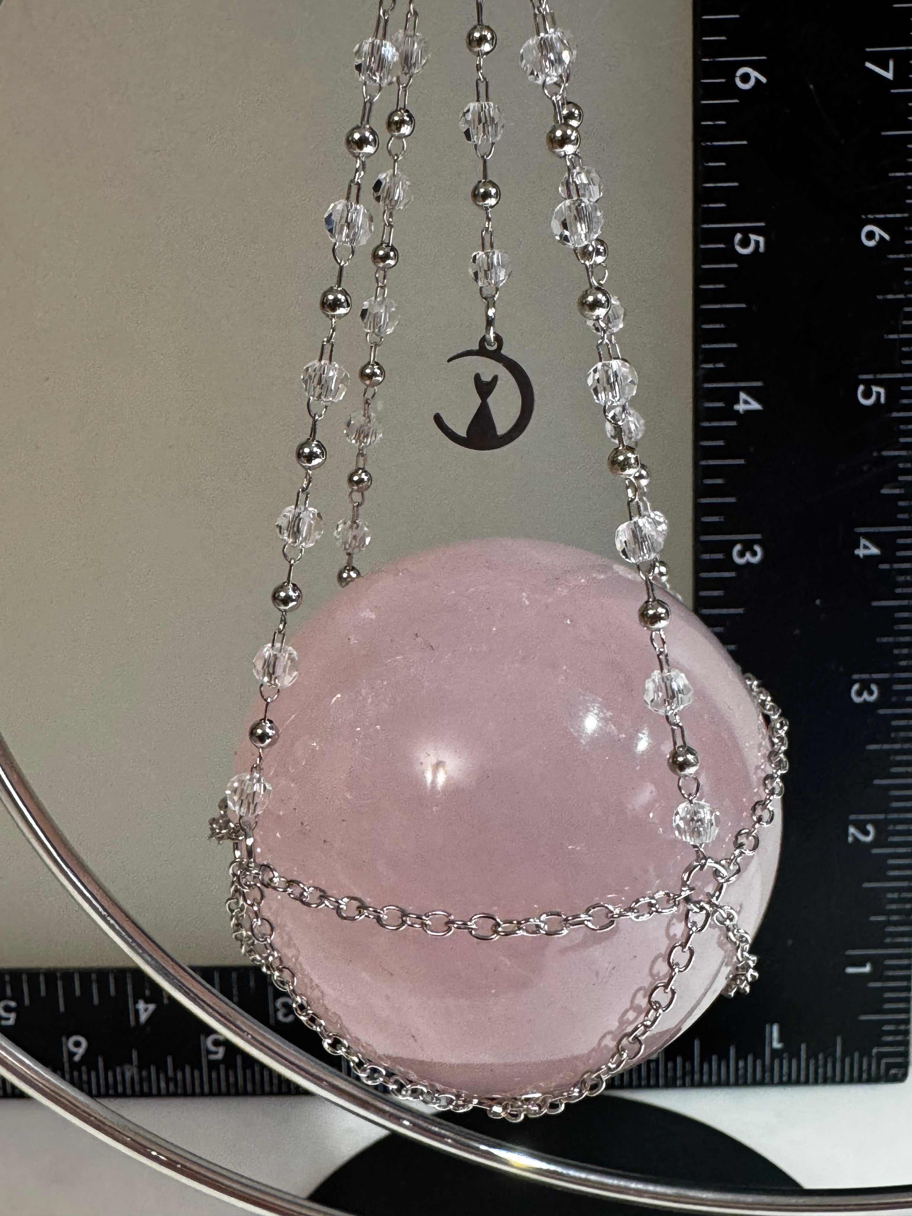 Rose Quartz Sphere with Crescent Moon Hanging Stand